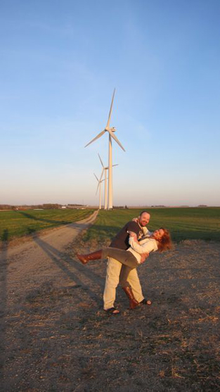 a couple on a windfarm