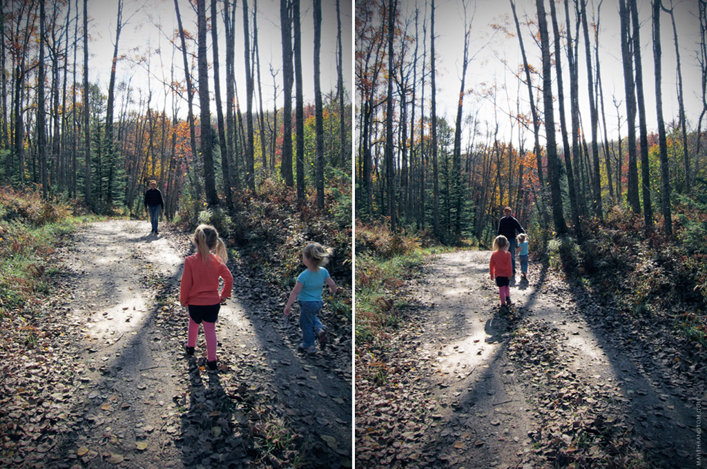 two shots, at slightly different points in time, of two girls running in the woods toward their grandfather