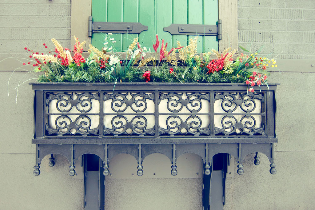 So what if this is fake greenery... it's pretty winter window decoration in Minneapolis